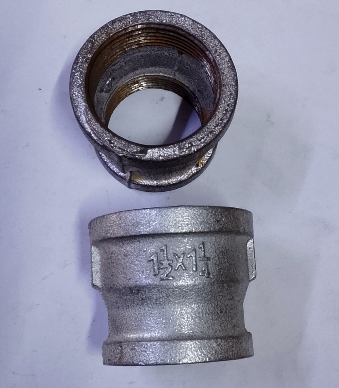 G. I REDUCING SOCKET 11/2*11/4